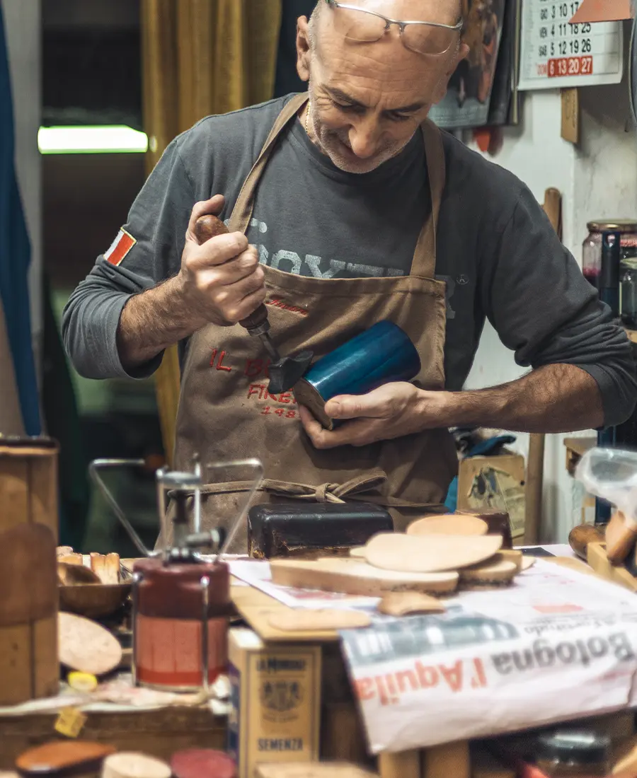 The Florentine Leather Artisan and the tools that carry the weight of every hand that ever used them.